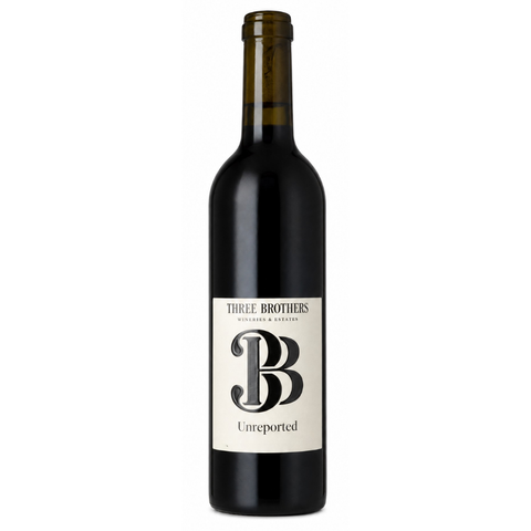 A dark glass wine bottle with a cream-colored label reading 'THREE BROTHERS WINES' and 'Unreported', shown against a plain white background.