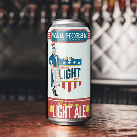 War Horse American Light Ale can on a bar counter with blurred taps in the background