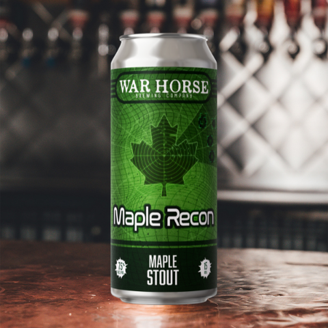 Can of War Horse Maple Recon Maple Stout on a bar counter with blurred bar background